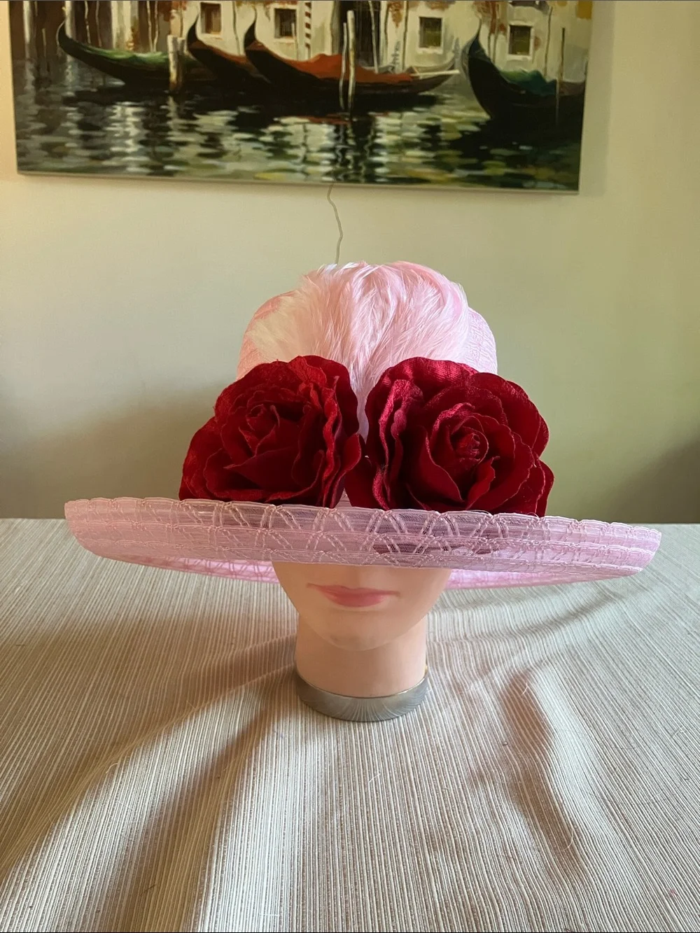 Chic Pink Wide-Brim Hat with Red Velvet Rose Detail and Feathered Accents